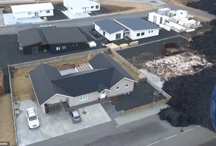 Astonishing aerial images show how one lucky homeowner escaped an expensive disaster after scorching lava from Iceland's volcanic eruption stopped just yards away from their house