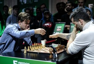 The world's number one chess player has caused an uproar in the community and is facing match-fixing allegations after sharing his world title with his Russian rival. Magnus Carlsen (L) gets ready to play against Ian Nepomniachtchi on Day 2 of the FIDE World Blitz Chess Championship at Cipriani Wall St on December 31