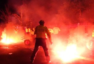 Legia Warsaw fans clash with police