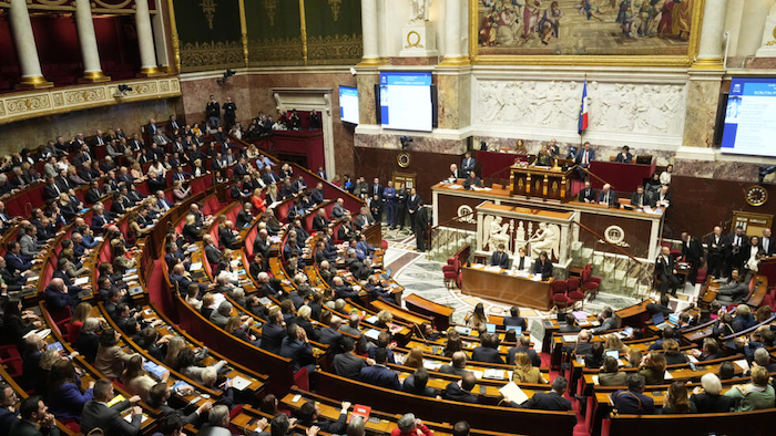 French Government Faces Crisis as Immigration Bill Defeated by United Opposition