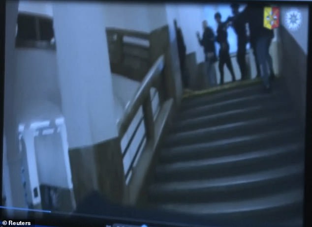 Now, tense bodycam footage has emerged showing elite cops sprinting towards the building and sprinting up the stairs towards the top floods in a bid to find Kozak who was picking off his victims one by one from the balcony