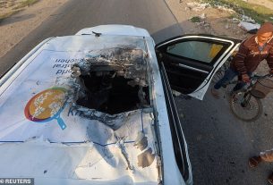 Damage to one of the three cars that was struck in the aid convoy attack on Monday