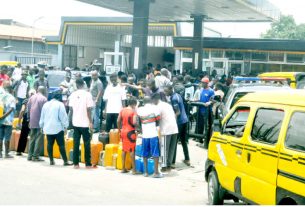 lagosians queue at a fuel station in ikeja, lagos