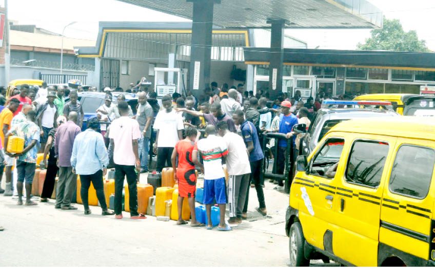 lagosians queue at a fuel station in ikeja, lagos