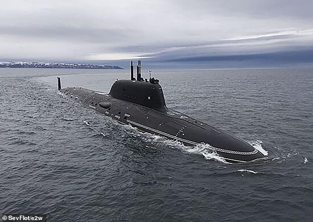 Russian warships are practising the use of high precision weapons in the Atlantic ocean, Russia 's defence ministry said on Tuesday, putting the US on alert. Pictured: Russia's Kazan Yasen-M submarine, part of the Northern Fleet, which is in-bound for Cuba