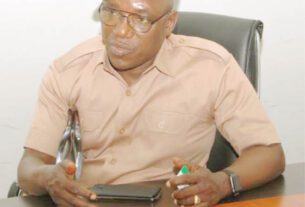 Immediate past minister of sports, Barrister Solomon Dalung answering questions when he visited the Corporate Headquarters of Daily Trust newspaper in Utako, Abuja